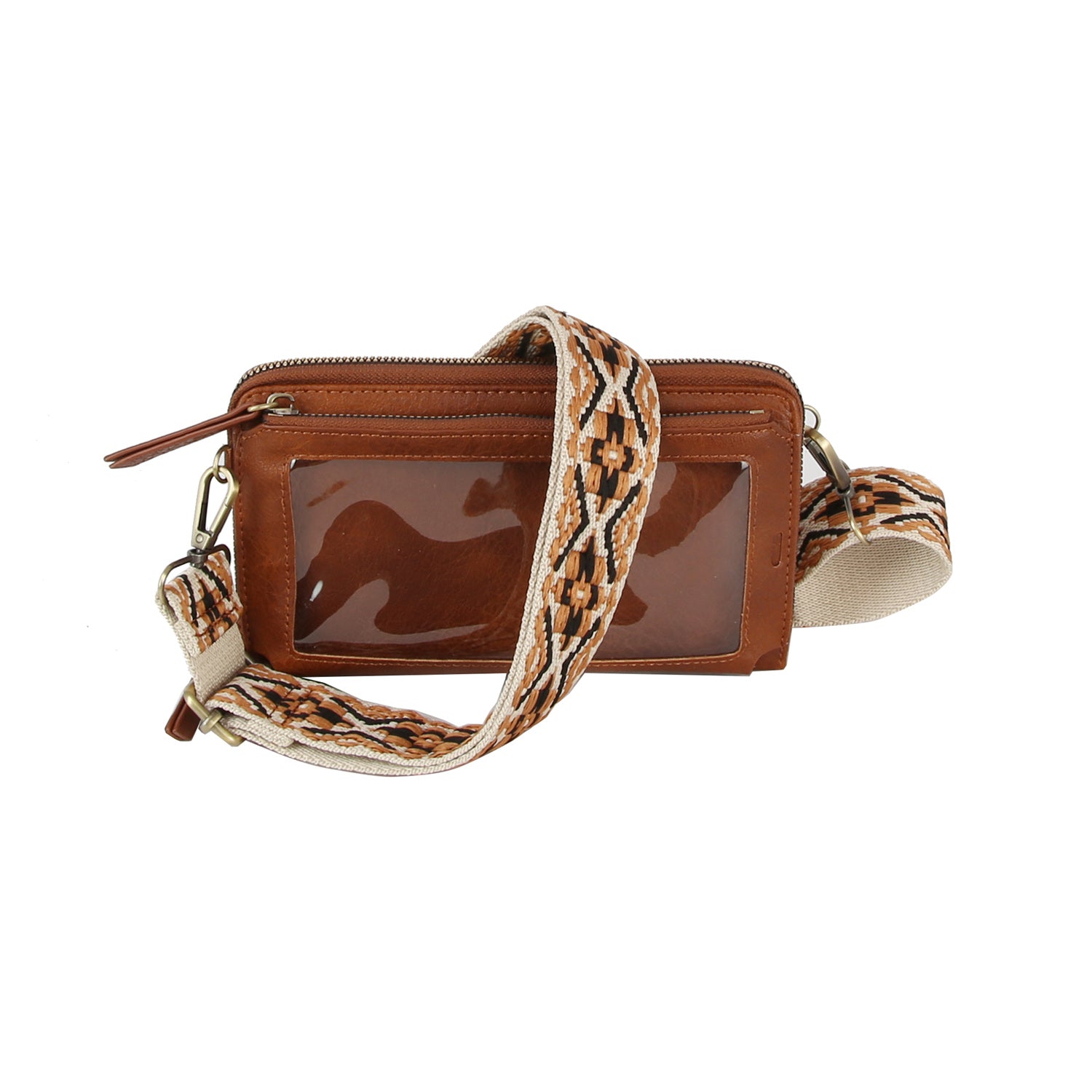 The Petite Multi Compartment Guitar Strap Crossbody is a brown faux leather bag with a clear front pocket and a wide, patterned beige and brown detachable strap.