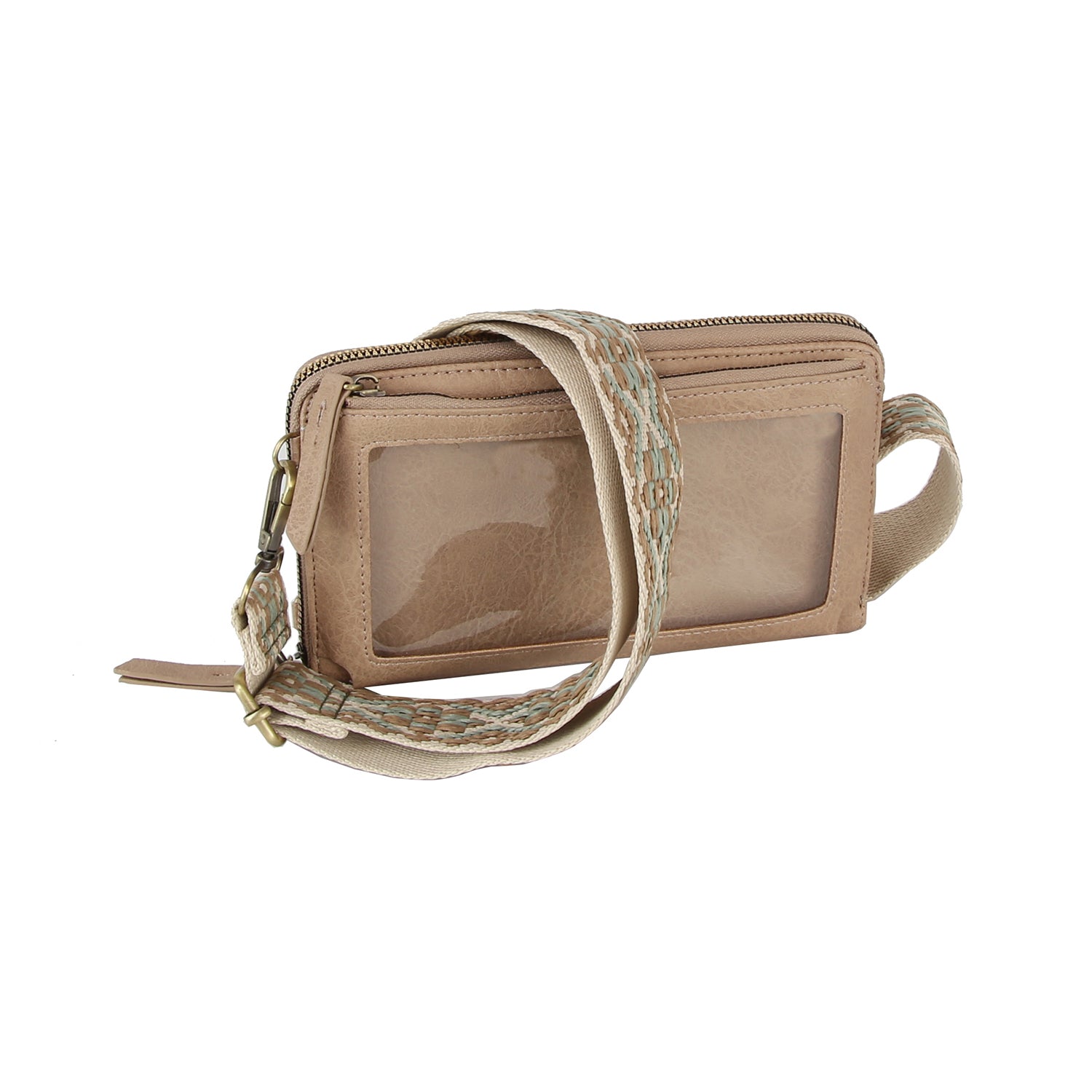 The Petite Multi Compartment Guitar Strap Crossbody is a tan faux leather wallet with a clear front pocket and a detachable beige woven-pattern strap, shown on a white background.