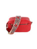 The Guitar Strap Crossbody Sling is a small rectangular red faux leather bag with gold zippers and hardware, featuring a wide adjustable strap decorated with a black, white, and red floral pattern.