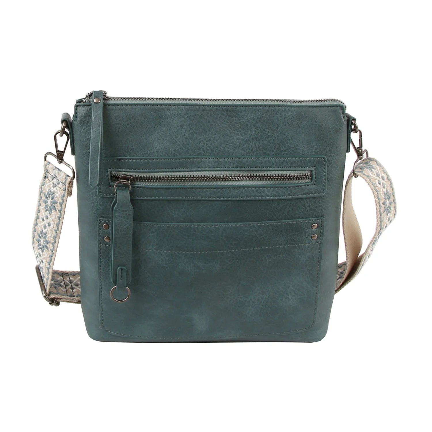The Guitar Strap Everyday Crossbody Sling is a teal faux leather bag with a front zip pocket, card slots, and a wide patterned adjustable strap, shown against a white background.