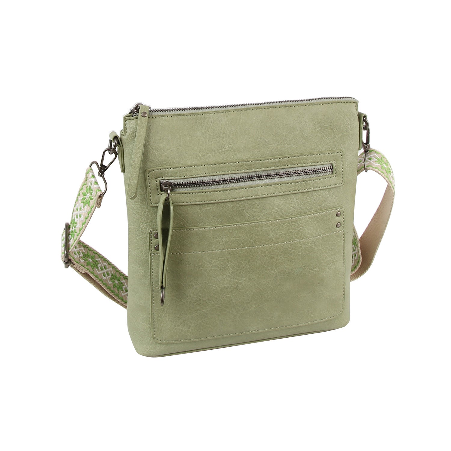 The Daily Zip Pocket Guitar Strap Crossbody Bag features light green faux leather, a front zip pocket, silver-tone hardware, a modern design, and a matching green patterned guitar strap.