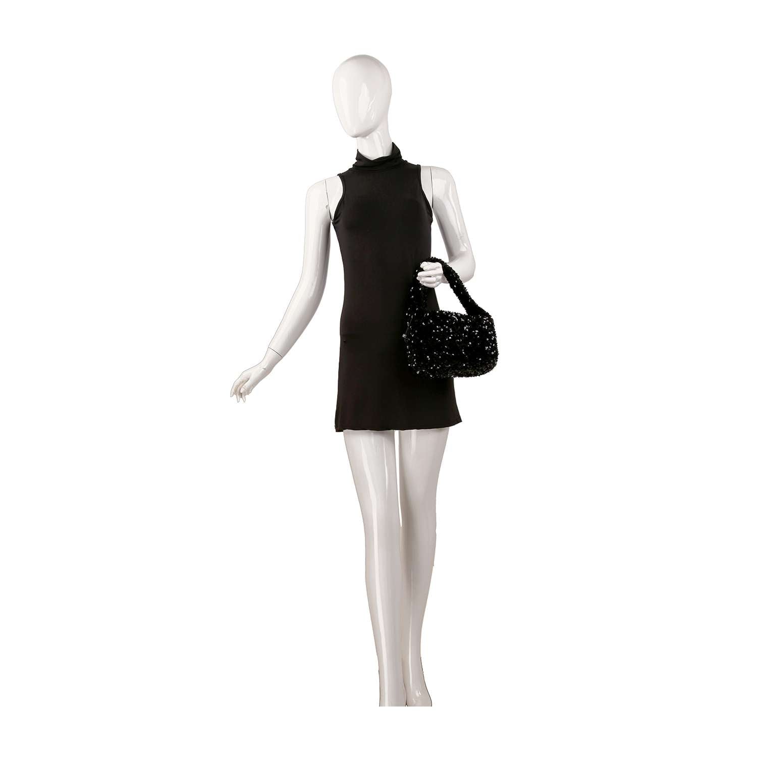 A white mannequin in a sleeveless black mini dress displays the Sequin Covered Dazzling Evening Bag on its left arm, standing against a plain white background.