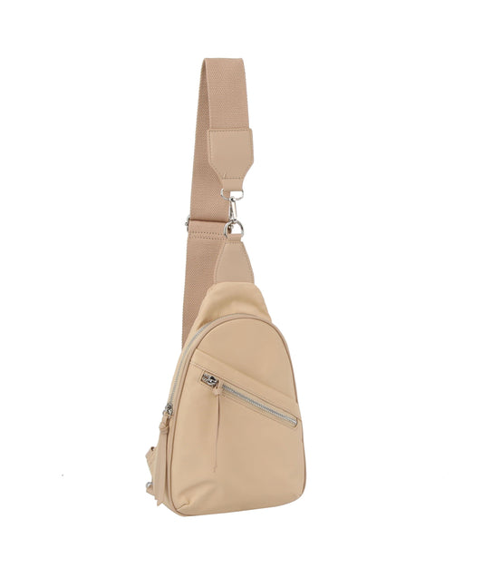 The Trendy Front Crossbody Sling is a beige faux leather handbag with a wide adjustable strap and front zip pocket, shown on a white background. Tablet compatible, it offers stylish functionality for everyday use.