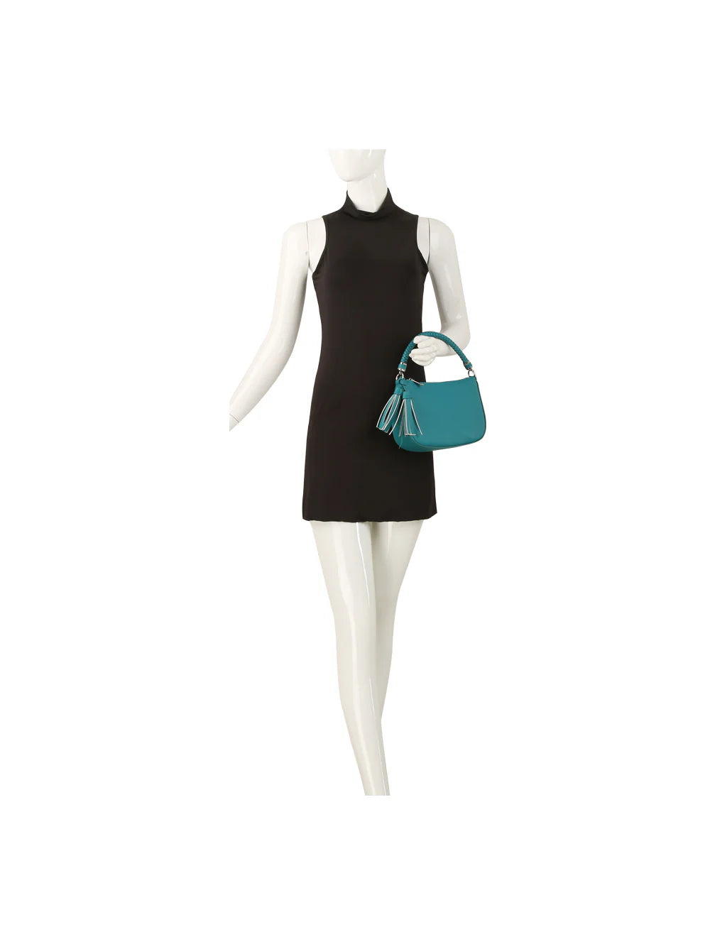 A mannequin in a sleeveless black mini dress holds the Braided Handle Tassel Hobo Handbag—a small faux leather teal bag with a tassel and braided handle—against a plain white background.