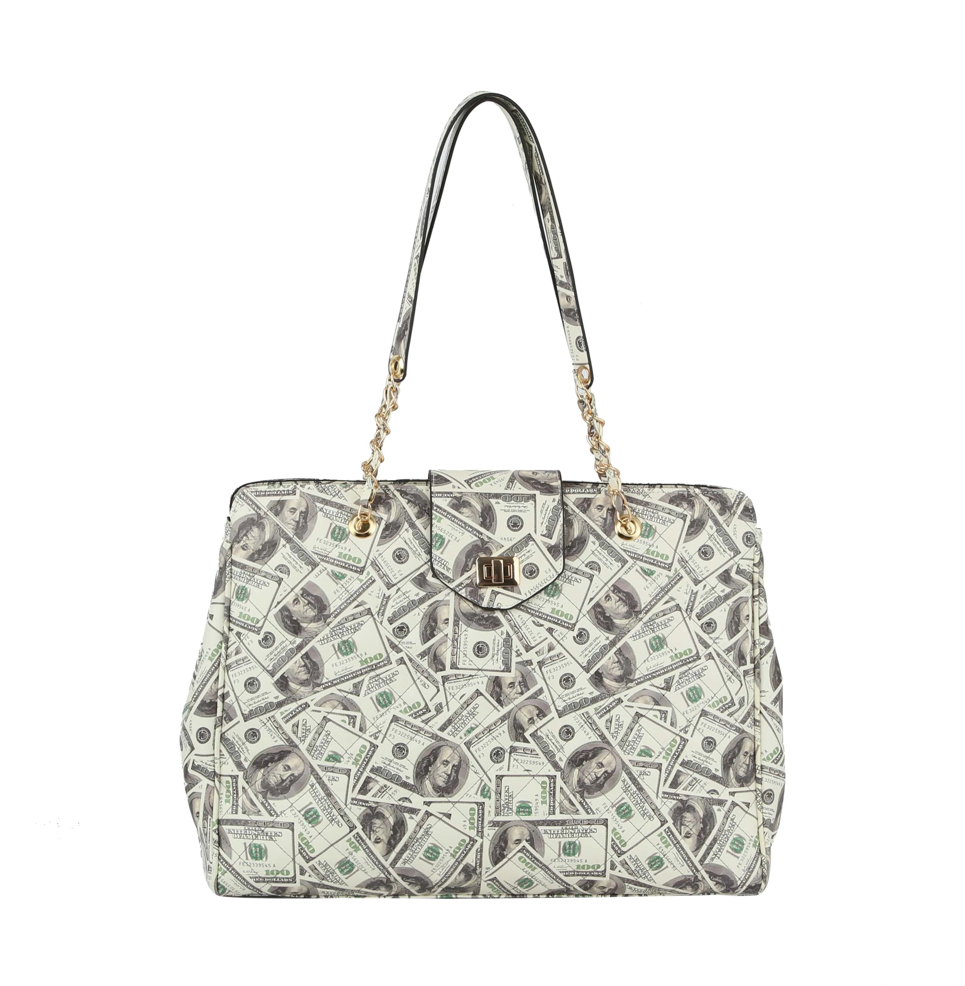 The Oversized Quilted Tote Travel Bag features an eye-catching overlapping U.S. hundred-dollar bill print, luxe faux leather, gold chain handles, and a gold front flap clasp for chic versatility.