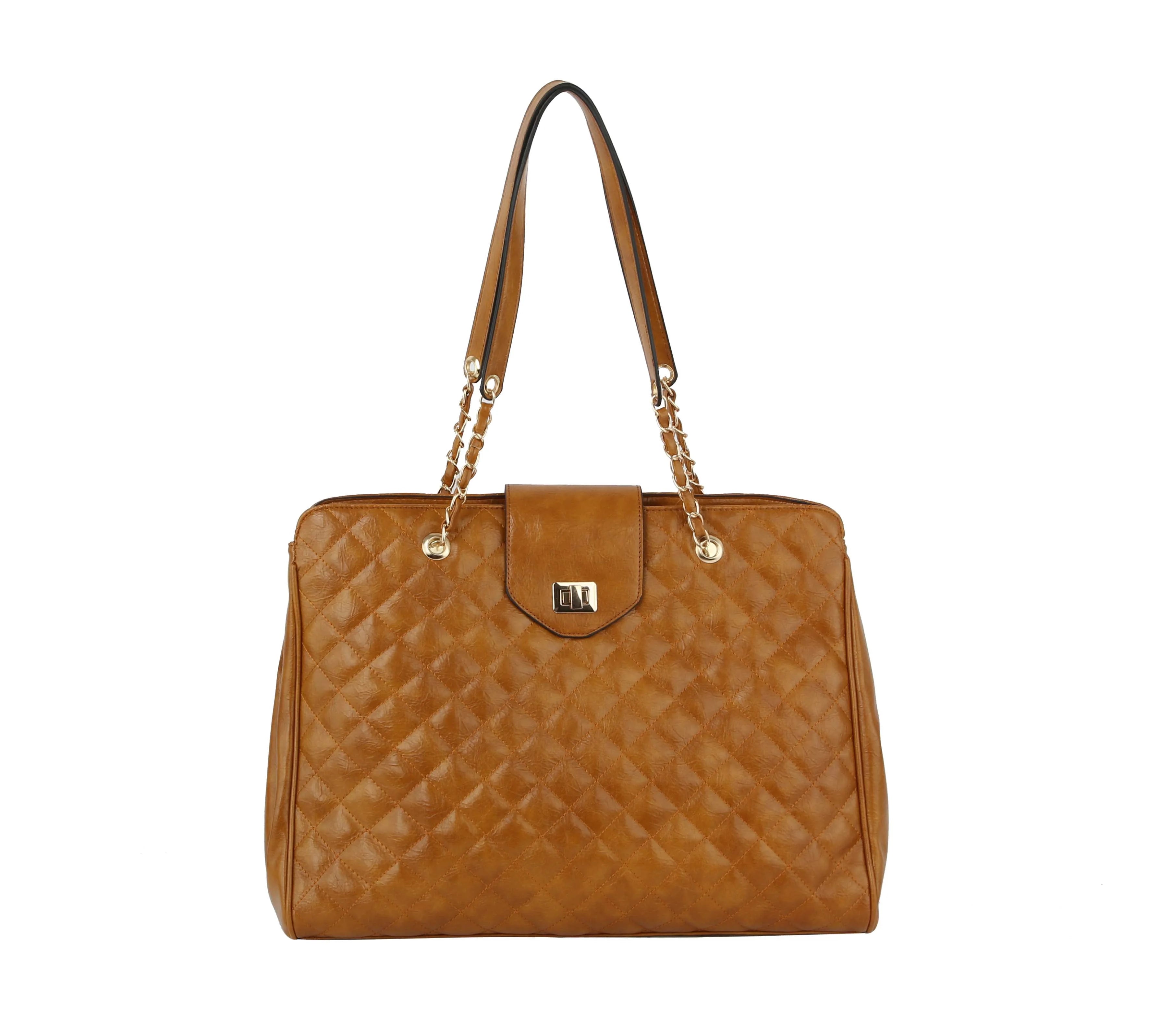 The Oversized Quilted Tote Travel Bag, in brown faux leather, features gold chain and leather shoulder straps, a front flap with metallic clasp, and is shown against a white background.