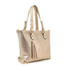 The Glamorous Rhinestone Shopper Tote is a gold faux leather handbag featuring double handles, a shoulder strap, metallic studs on the front, and a decorative tassel hanging from one handle.